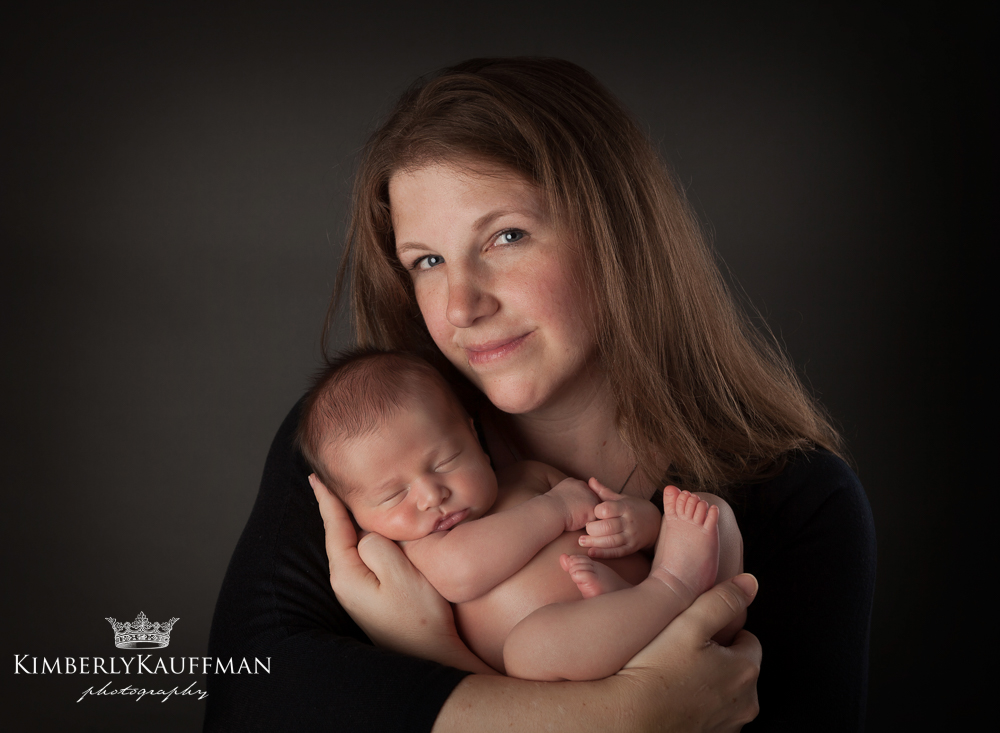 beautiful mother with newborn