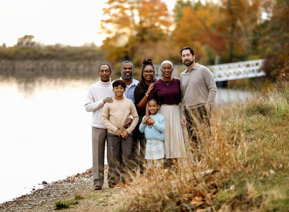Mom and child hugging with sun flare during a Bucks County, PA family session
